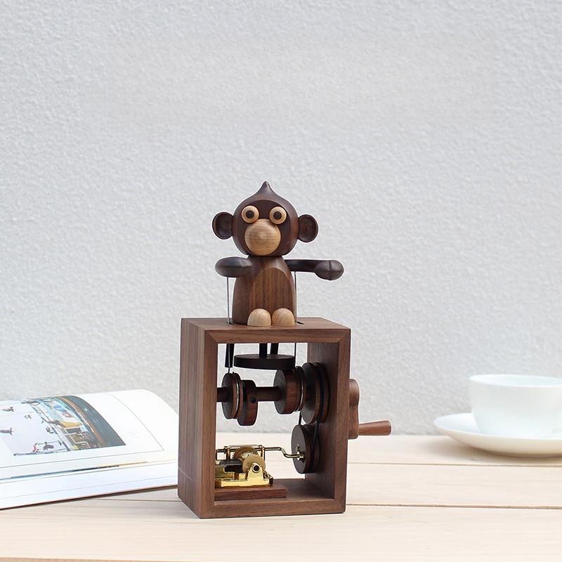 Wooden music box with monkey shape