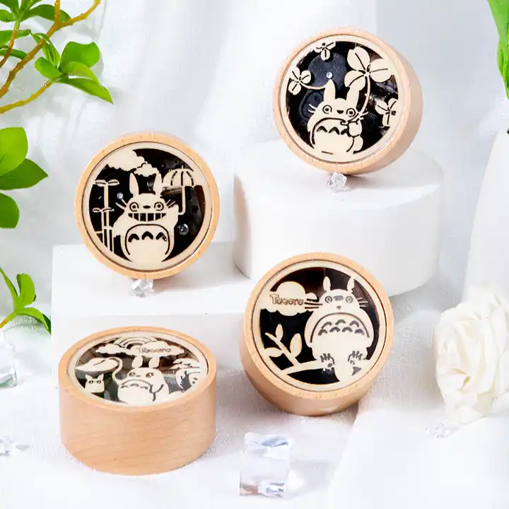 four wooden music box with cute patterns