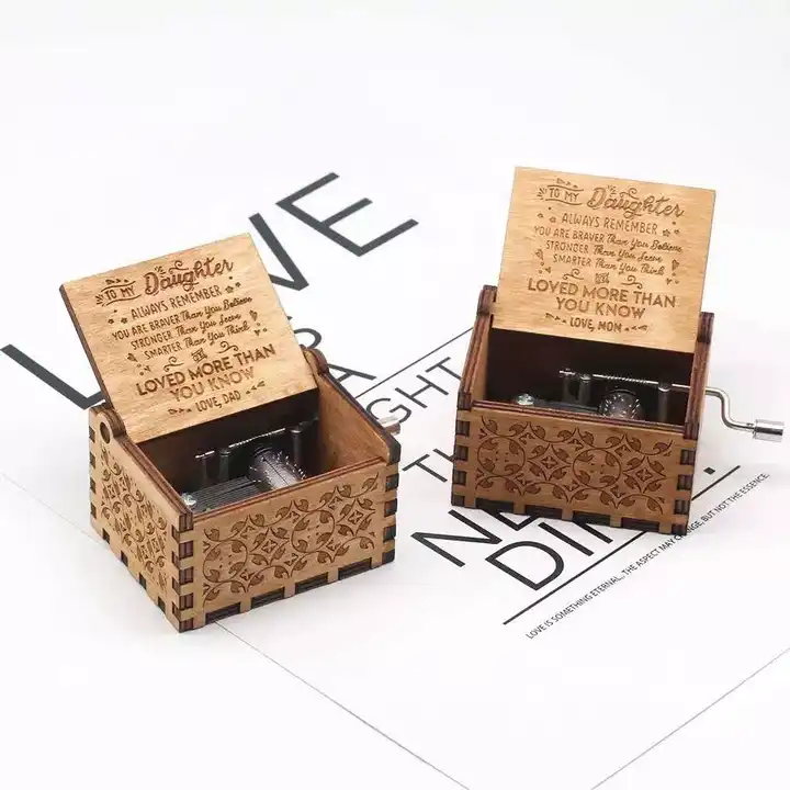 two wooden music boxes