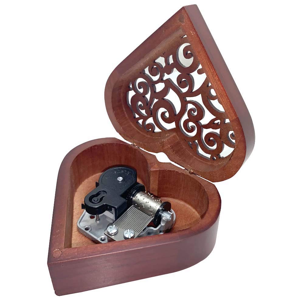 a wooden music box like a heart